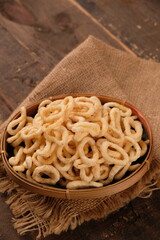 Lanthing or klanthing is a snack like crackers made from cassava dough. Indonesian food. Lanting.