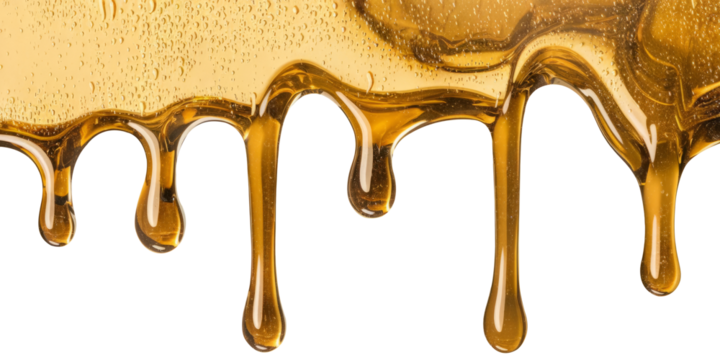 golden honey dripping on white background