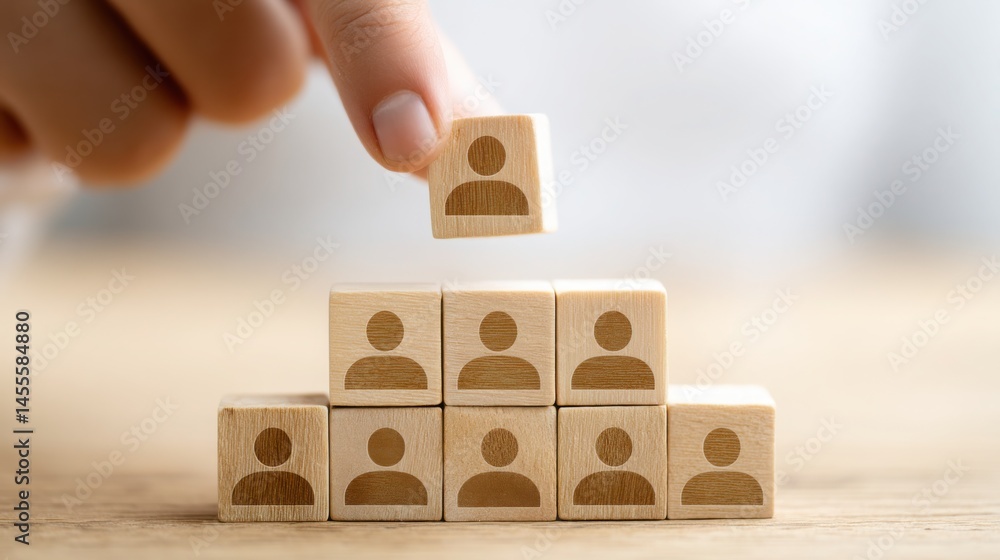 Poster individual placing a block of wood within a larger block to symbolize mental detachment and strategi