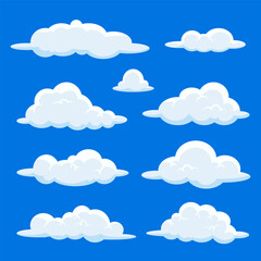Set of cartoon cloud in a flat design. Fluffy white cartoon clouds in blue sky vector set.
