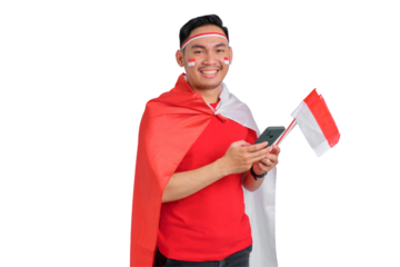 Happy young Asian man using a mobile phone isolated on transparent background. Indonesian independence day concept
