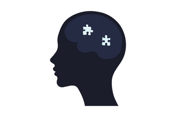 Silhouette of a human head with brain made from puzzle pieces.