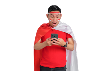 Shocked young Asian man holding a mobile phone isolated on transparent background. Indonesian independence day concept