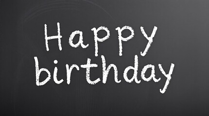 Obraz premium Happy birthday chalk effect text on a chalkboard.