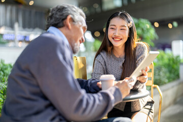 Father and daughter relationship, family bonding moment, happy asian dad and daughter using tablet together outdoors sharing love, connection and joyful interaction in modern digital family lifestyle