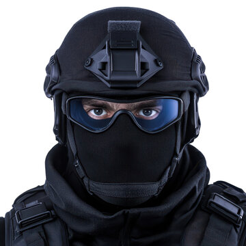 Man in black uniform representing covert operations isolated on bright clean white background.