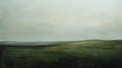 Fototapeta premium Foggy Landscape With Rolling Hills and Muted Colors, Depicting an Atmospheric Scene of Nature's Tranquility at Dawn