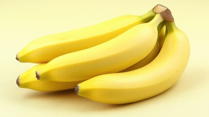 Bunch of ripe bananas on a pale yellow background showcasing healthy eating and fresh fruit goodness