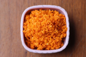 Dry garlic chutney made from red chilly and dry coconut, peanuts and sesame, Indian food, sesoning served with various dishes