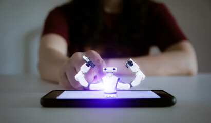 Artificial intelligence robot technology concept human hand touching smartphone