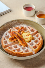 Golden Waffles Caramelized Bananas Butter and Powdered Sugar