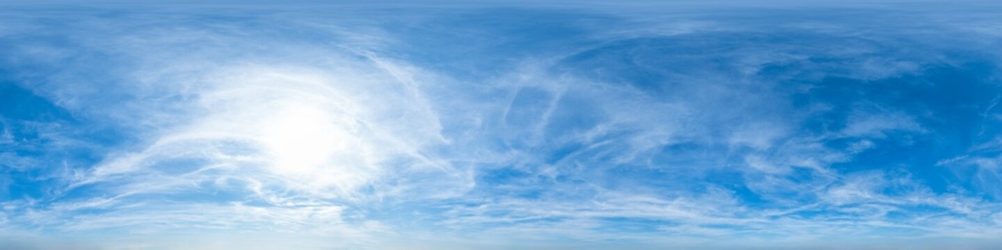 Seamless 360 degree hdri spherical panorama sky dome with fluffy clouds and sun