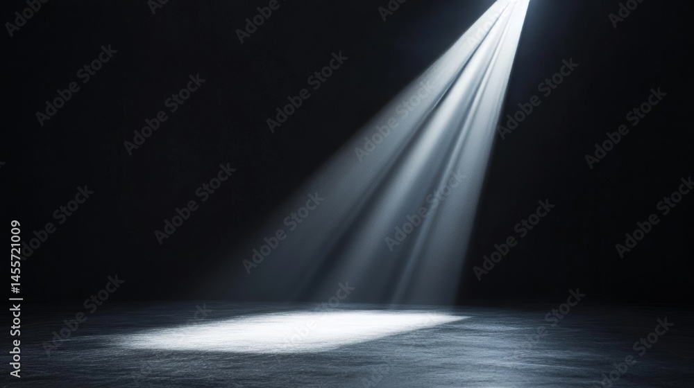 Poster light beams create a dramatic atmosphere in an empty dark space highlighting textures on the floor d