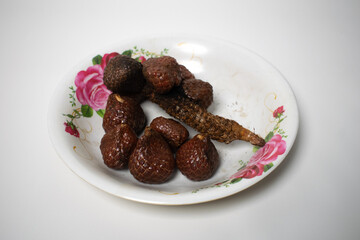 Kelubi fruit is served on a floral patterned plate