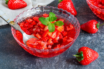 Homemade fruit jelly with fresh strawberries