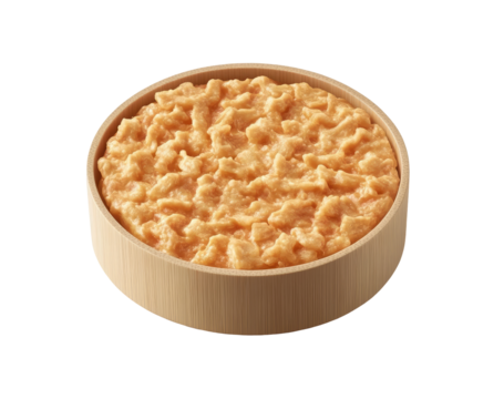 Creamy, scrambled egg dish in a wooden bowl