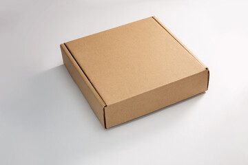 Brown cardboard box isolated on white background