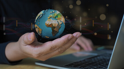 A person's hand cradles a stylized representation of Earth, symbolizing the intersection of technology and global awareness, showcasing connectivity and the digital realm. 