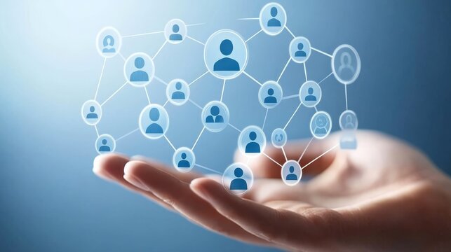 Interconnected global network, hand holding a diverse community of people icons symbolizing teamwork and collaboration