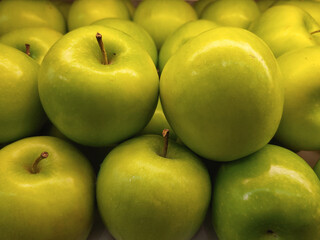 Fresh Shiny green apple (Malus domestica) pile for background