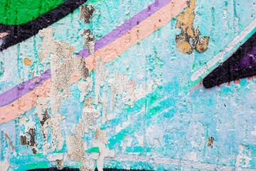 Textured abstract wall art in pastel blue, pink, purple with distressed surfaces. Modern 90s aesthetic, graffiti style, urban elements. Digital art, creative backgrounds, design projects.