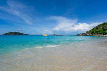 Empty tropical beach and seascape, Beautiful sandy beach and sea in sunny day,Blue sky in good weather day, Beach sea space area nature background