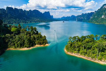 Aerial view drone shot of scenery mountains tropical rainforest in thailand,Khao Sok Thailand Scenic mountains with lake in Khao Sok National Park