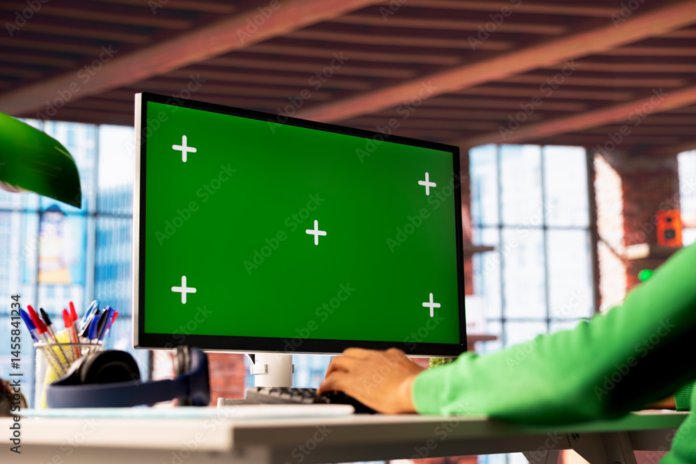 Poster man enjoying leisure time in apartment, using isolated screen pc screen to text friends. person talk