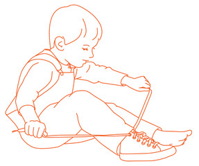 Boy sitting on floor putting on shoes Boy sitting on floor putting on shoes