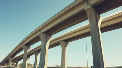 Elevated highway curves under clear blue sky