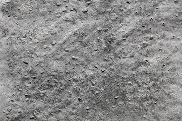 gray background, photo shows texture of building wall close-up