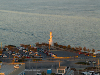 Faro de la Savina en el puerto de Formentera al atardecer, Islas Baleares.