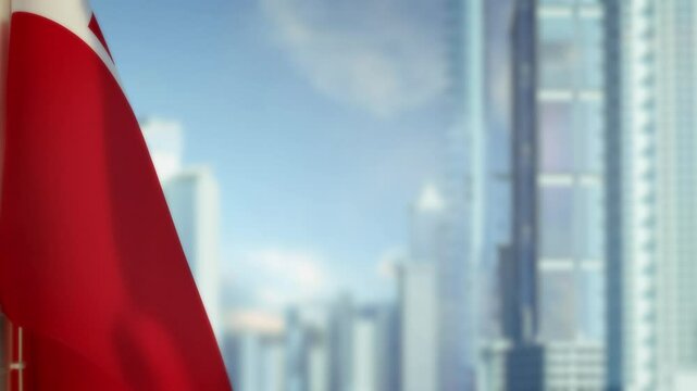 hanging Tonga flag on city backdrop with blue sky