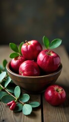 Crimson apples in rustic bowl, eucalyptus & holly sprigs on wood , background, close up, food