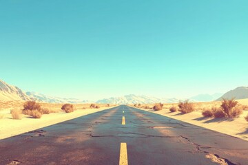 Long Desert Road Through Sand Dunes Under Clear Blue Sky