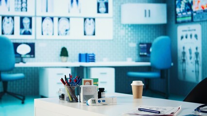 Well organized empty medical cabinet ready for healthcare services, featuring medical test results and radiography scans. Tools and equipment for accurate diagnostics and patient care. Close up.