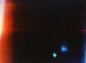 Light leaks and film grain creating an abstract background texture