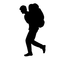 silhouette of a man carrying a hiking bag