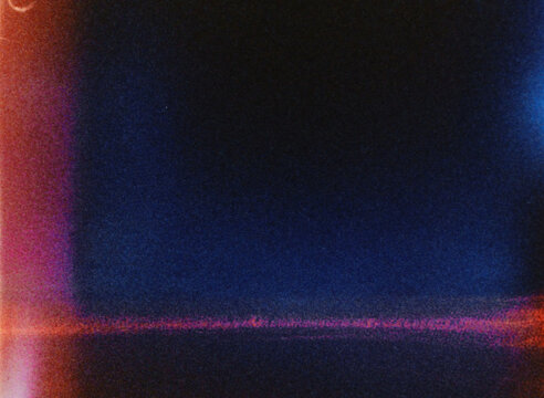 Colorful light leaks creating abstract background with film grain and texture