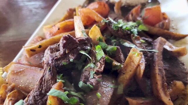 A plate of Peruvian Lomo Saltado cuisine 