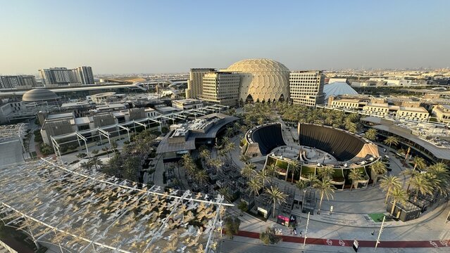 Aerial view of Dubai exhibition center at sunset, showcasing the vibrant city skyline and architectural wonders.