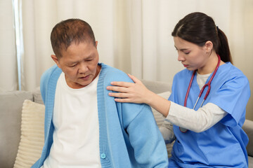 Physiotherapist carefully examines elderly patient’s shoulder, offering gentle assistance and personalized care to improve mobility and reduce discomfort.