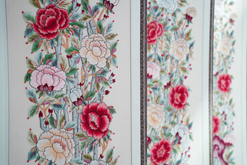 Close-Up of Traditional Korean Folding Screen with Embroidered Floral Decorations