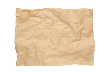 Crumpled piece of beige parchment or baking paper isolated on white background. Copy space for text and design element.