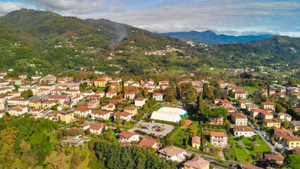 Stunning aerial panorama of Barga, Garfagnana, with clear skies and scenic landscapes