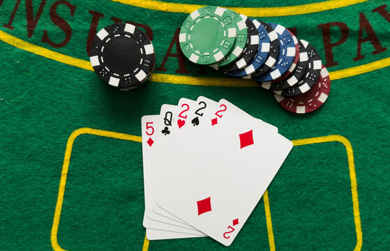 Poker cards with combination. The winning combination in a game in a poker club. The concept of luck in the poker game.