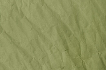 Abstract wrinkled green crumpled paper texture background