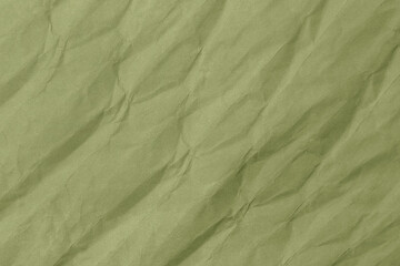 Abstract wrinkled green crumpled paper texture background