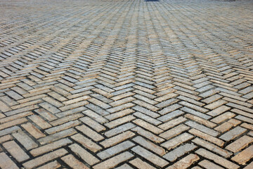Fototapeta premium The art and charm of historic brickwork that showcases meticulous pattern in a durable walkway