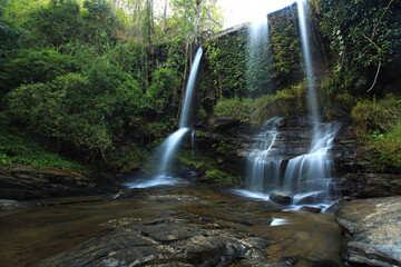 The beauty of Mae Sapok Waterfall, a small waterfall with a peaceful atmosphere. The rainy season is the best time to visit. Chiang Mai Province, Thailand
